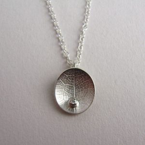 Diamond oval dish necklace