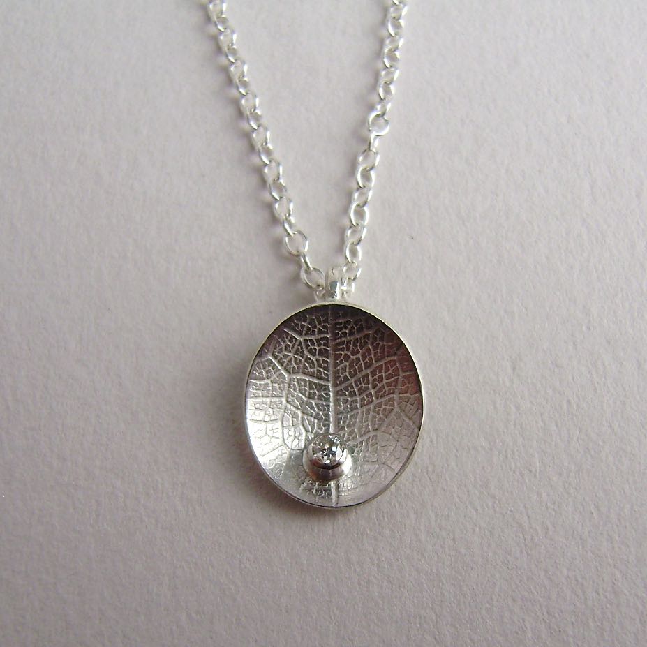 Diamond oval dish necklace