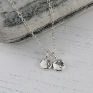 Double nugget charm pendant