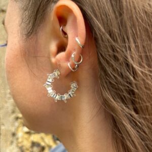Alternative view of XYZ silver small squiggles hoops