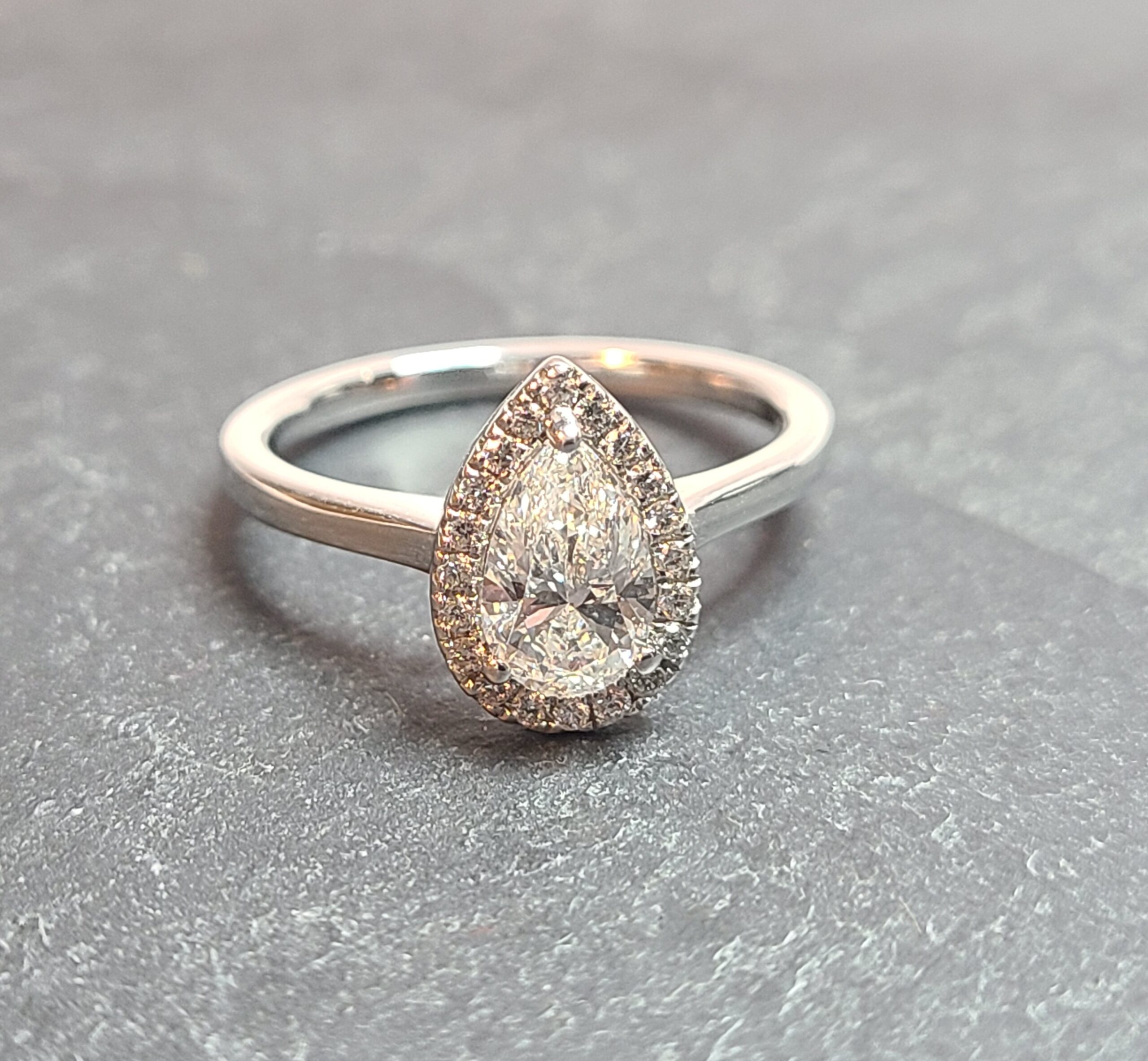 Pear diamond halo ring